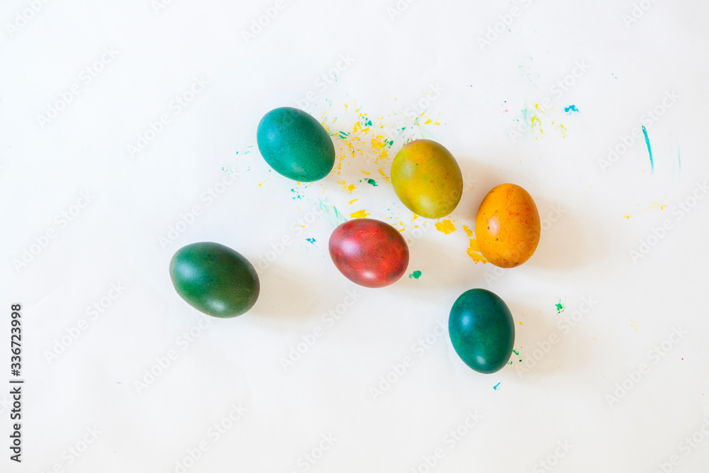 Easter eggs on white background. Decoration of eggs. Easter celebration with colorful easter eggs. Bunte Ostereier auf weißem Hintergrund. Ostereier kreativ färben. Easter eggs on white background. Decoration of eggs. Easter celebration with colorful easter eggs. Bunte Ostereier auf weißem Hintergrund. Ostereier kreativ färben.
