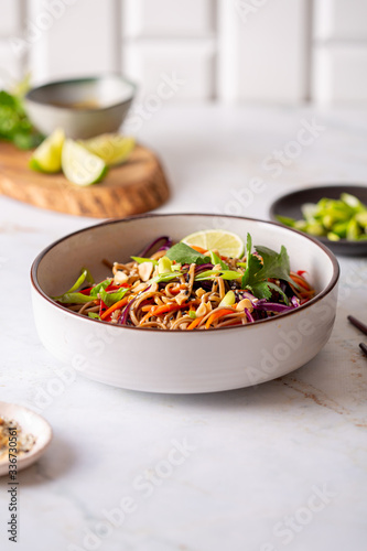 Buckwheat or soba noodle salad with vegetables and peanut sauce