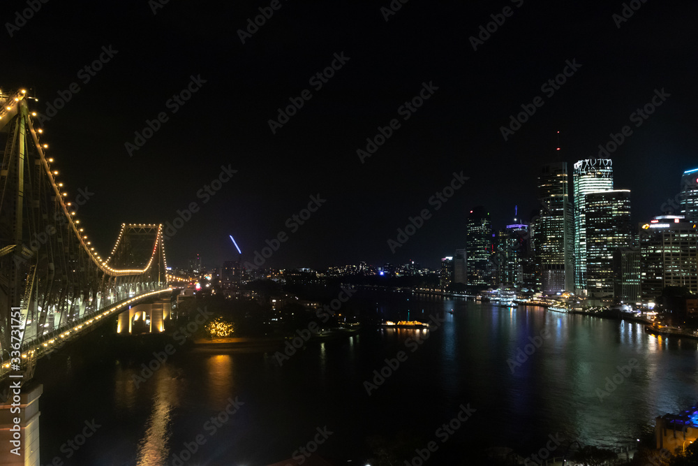 bridge at night with city view