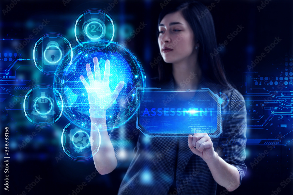 Business, Technology, Internet and network concept. Young businessman working on a virtual screen of the future and sees the inscription: Assessment Business, Technology, Internet and network concept. Young businessman working on a virtual screen of the future and sees the inscription: Assessment