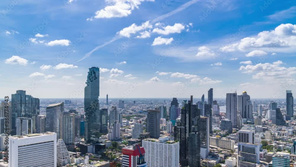 Bangkok business district city center above Silom area, with cloud pass over buildings and skyscrapers, zoom in – Time Lapse Bangkok business district city center above Silom area, with cloud pass over buildings and skyscrapers, zoom in – Time Lapse