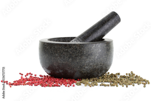 Wallpaper Mural side view of peppercorns with mortar and pestle isolated on white