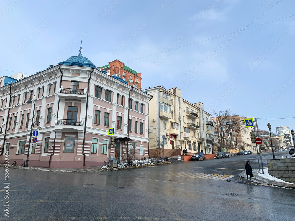 Vladivostok, Russia, February, 29,2020. The intersection of Ocean Avenue and Fontannaya street. Vladivostok Telegraph building of the early 20th century