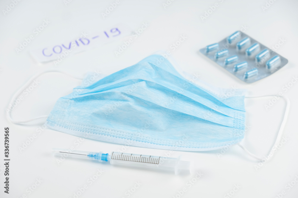 Coronavirus prevention medicall masks, syringe and pills. Stop COVID-19 Coronavirus prevention medicall masks, syringe and pills. Stop COVID-19