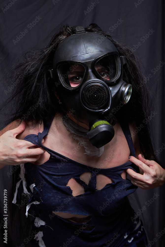 Girl in a gas mask, pandemic virus covid2019