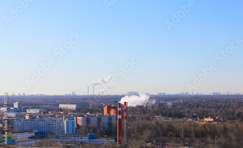 Pipes in city pollution of air with smoke view from a height