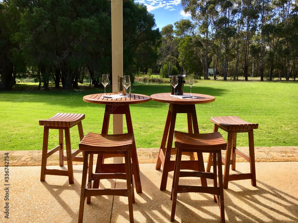 Table and chairs outside at a vineyard