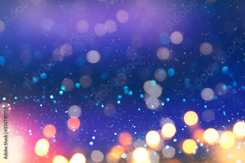 Christmas and Happy new year on blurred bokeh with snowfall banner background