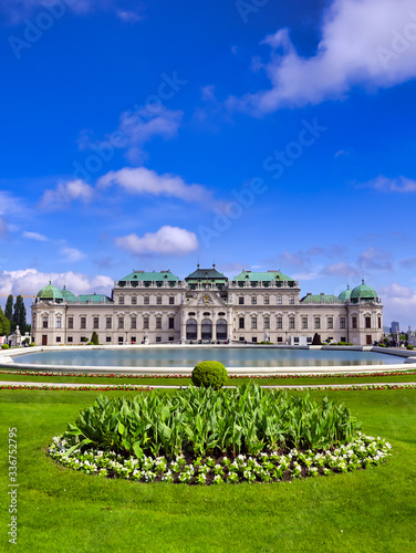 Obraz na płótnie Vienna, Austria - May 17, 2019 : Baroque palace Belvedere is a historic building complex in Vienna, Austria, consisting of two Baroque palaces with a beautiful garden between them. w salonie