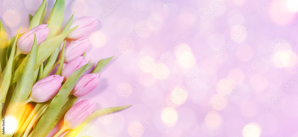 Fototapeta premium Spring flowers on the wooden background, greeting card for Mothers Day, 8 March, easter