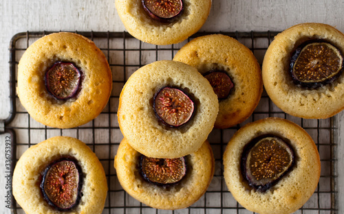 Overhead view of freshly baked fig hazelnut financiers