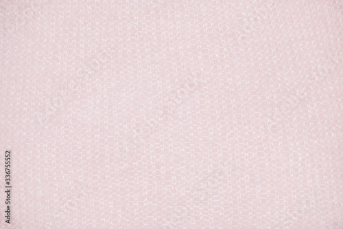 fluffy, knitted peach color texture