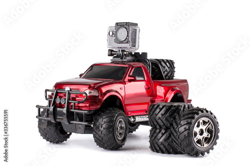 radio controlled car with action camera isolated on white background.