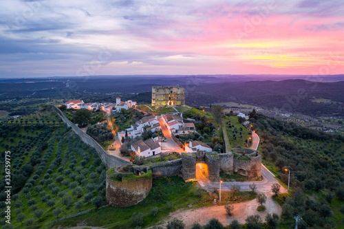 Evoramonte drone aerial view of village and castle at sunset in Alentejo, Portugal