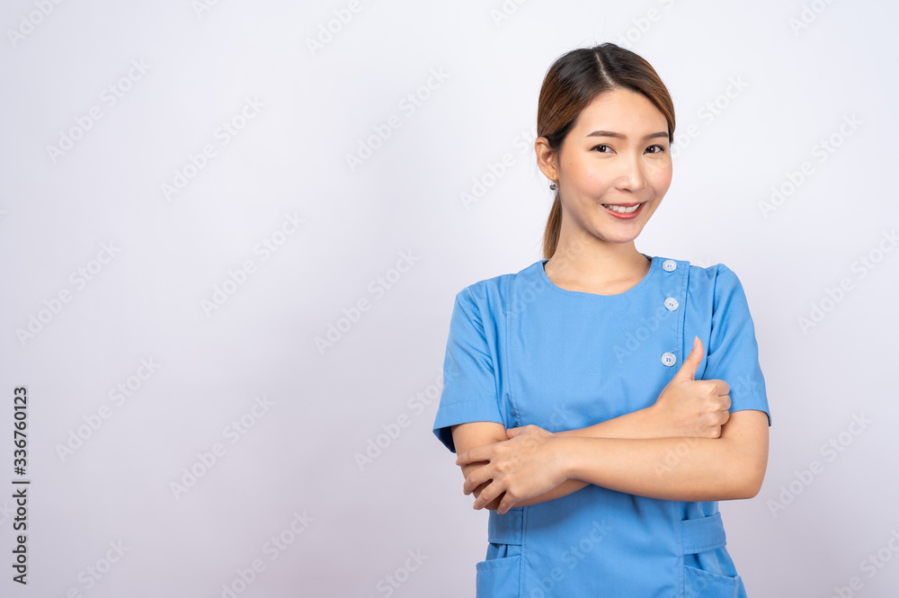 Portrait of young asian nurse on white background Portrait of young asian nurse on white background