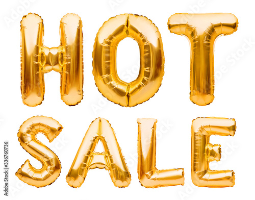 Words HOT SALE made of golden inflatable balloons isolated on white background. Helium balloons gold foil forming phrase super sale. Discount and advertisement