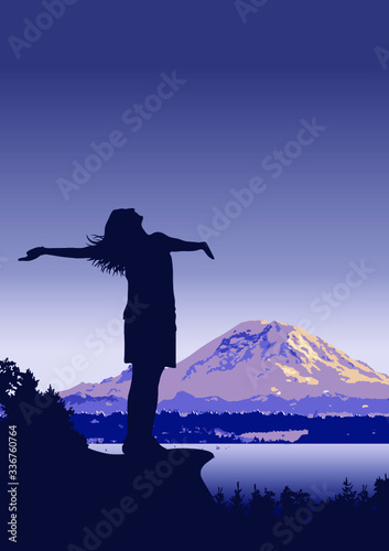 silhouette of a woman in the mountains feeling free with outstretched arms