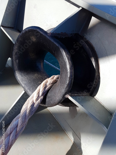 Mooring textile rope crossing a drillship fairlead photo