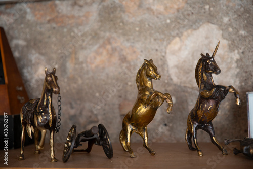Εκτύπωση καμβά The animal statue, trinket as a decoration object on a flat background