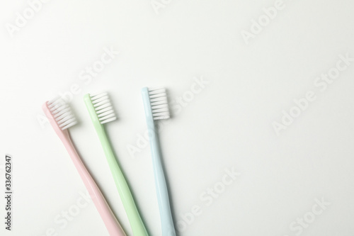 Toothbrushes on white background  top view. Dental care