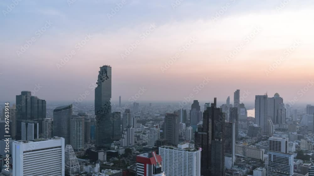 Bangkok business district city center above Silom area, with buildings and skyscrapers, day to night; zoom in – Time Lapse Bangkok business district city center above Silom area, with buildings and skyscrapers, day to night; zoom in – Time Lapse