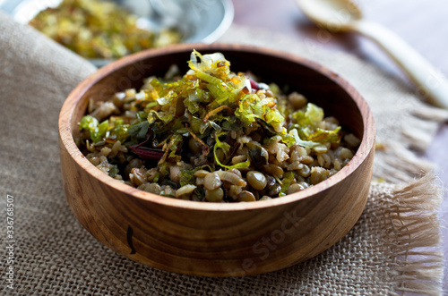 Mujadara with crispy leeks and spring greens photo