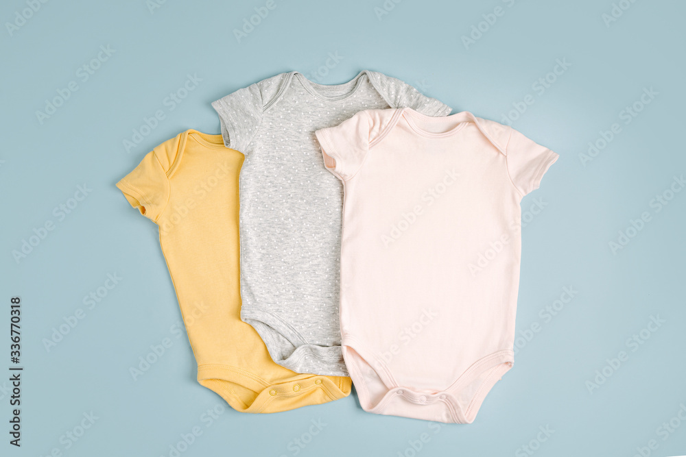 royalty Blive revidere Neutral cute baby bodysuits. Set of kids clothes. Fashion newborn. Flat  lay, top view Stock Photo | Adobe Stock