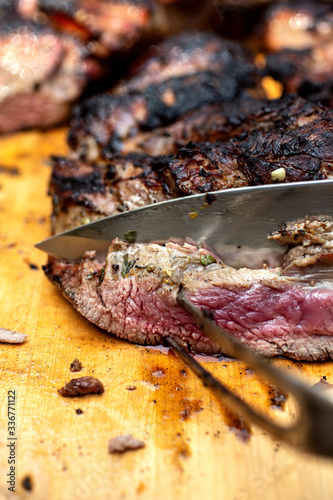 Close up of grilled garlic and herb rubbed lamb