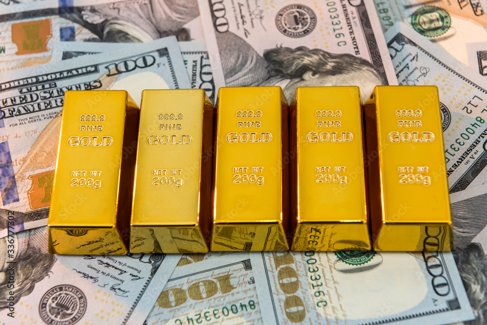 dollar with golden bars as finance wealth or savings concept. pile of us banknote and gold dollar with golden bars as finance wealth or savings concept. pile of us banknote and gold