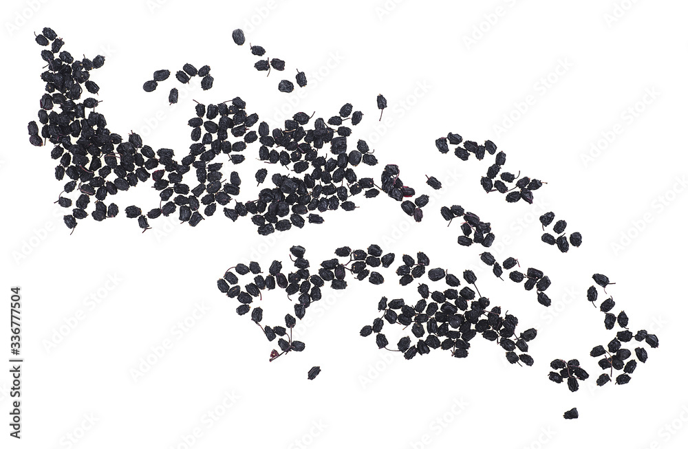 Dried elderberries isolated on a white background, top view. Dried elderberry fruits. Dried elderberries isolated on a white background, top view. Dried elderberry fruits.