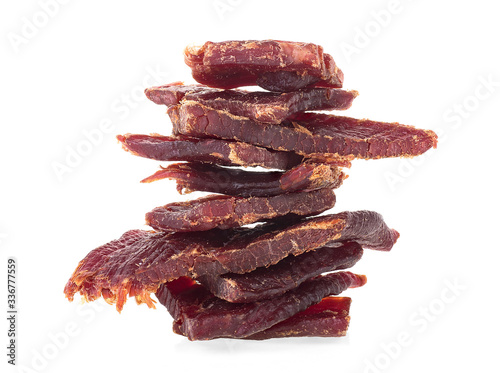 Beef jerky pieces isolated on a white background. Portion of beef jerky.