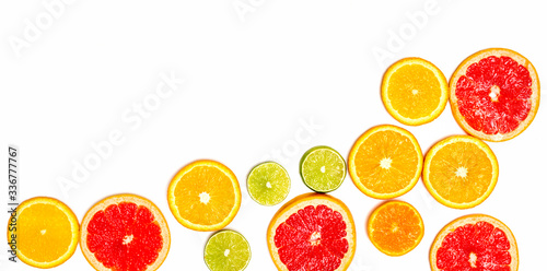 Creative sample of lime  orange and grapefruit. flat lay. Food concept. Lime orange and grapefruit on a white background