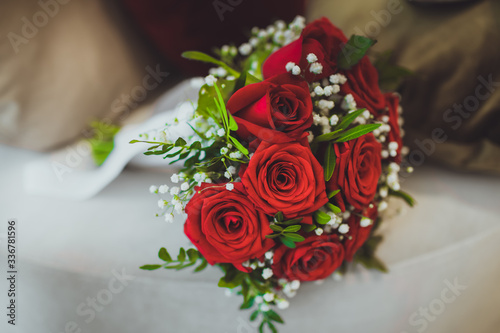 Delicate wedding bouquet of white and red roses.Delicate wedding bouquet of white and pink roses