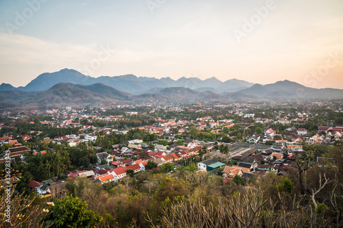 Beautiful panoramic view over Luang Prabang from Phousi Hill at sunset in Laos © icephotography