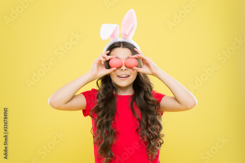 Little girl easter eggs. Happy girl. Bunny celebrate Easter. Keep day holy when Masses are cancelled. Spring holiday activities. Quarantined Sunday. Fun and educational Easter activity for kids © be free
