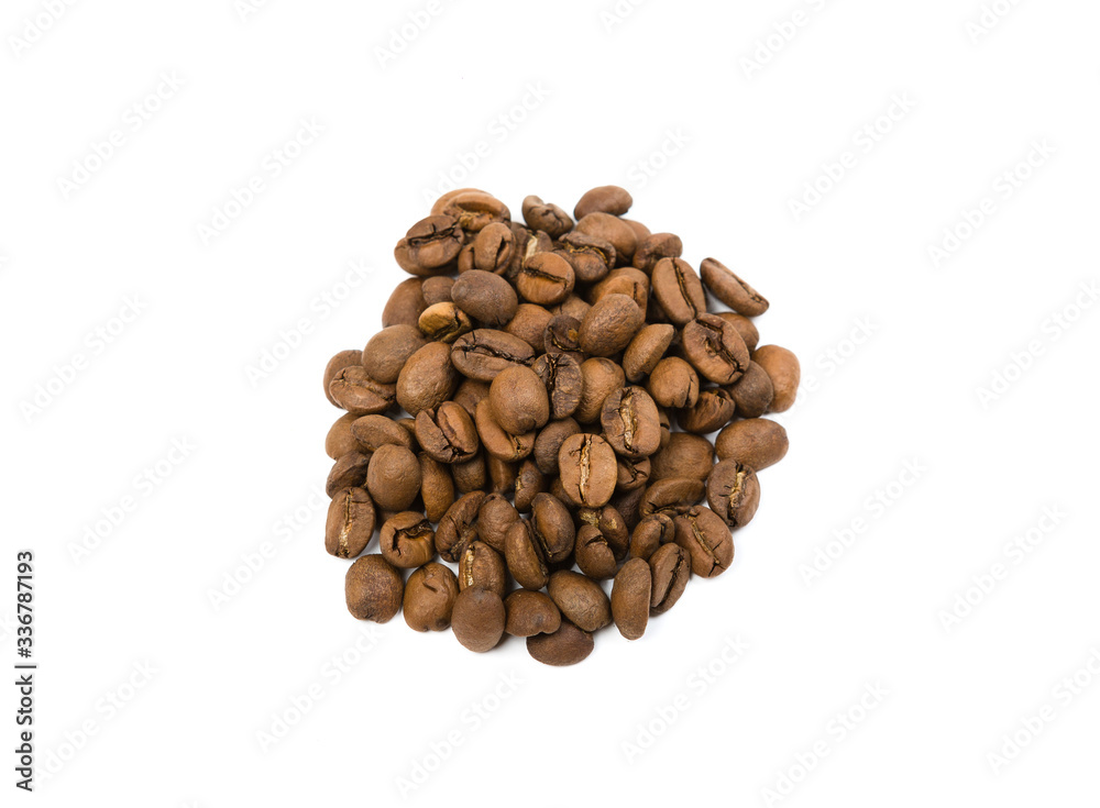 Coffee beans laid out on a white background surface Coffee beans laid out on a white background surface