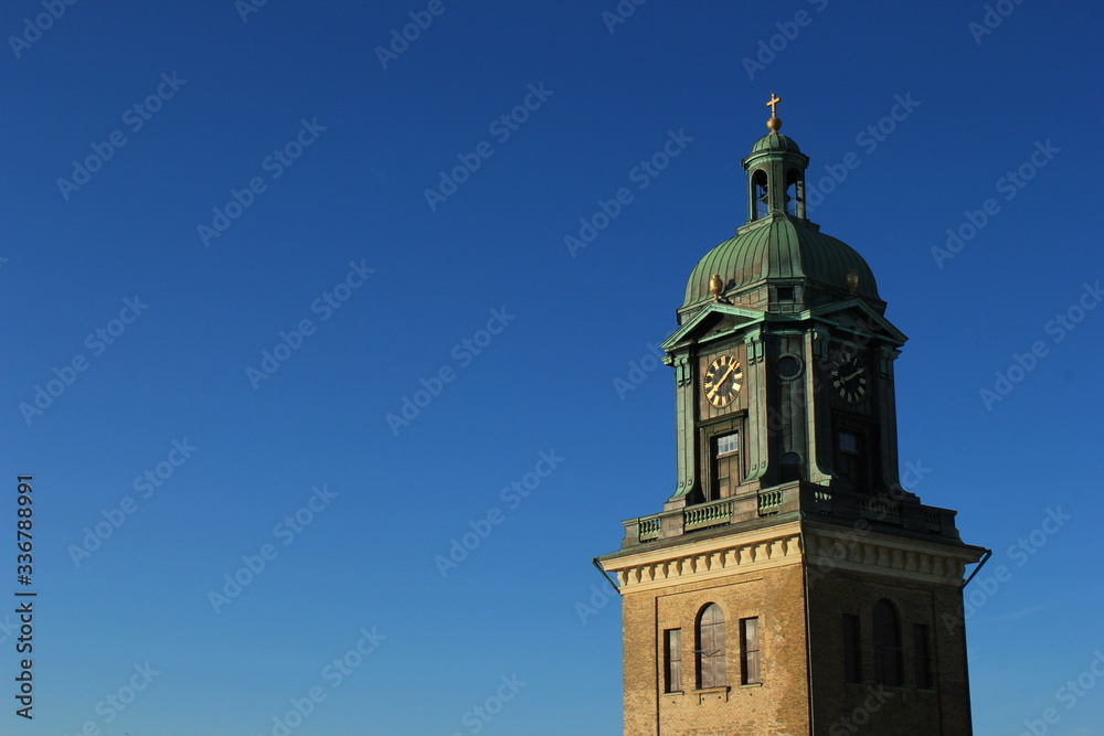 Beautiful church tower against a blue sky. 