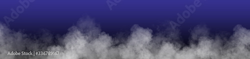 Smoke on the blue background. Clouds on the blue sky.