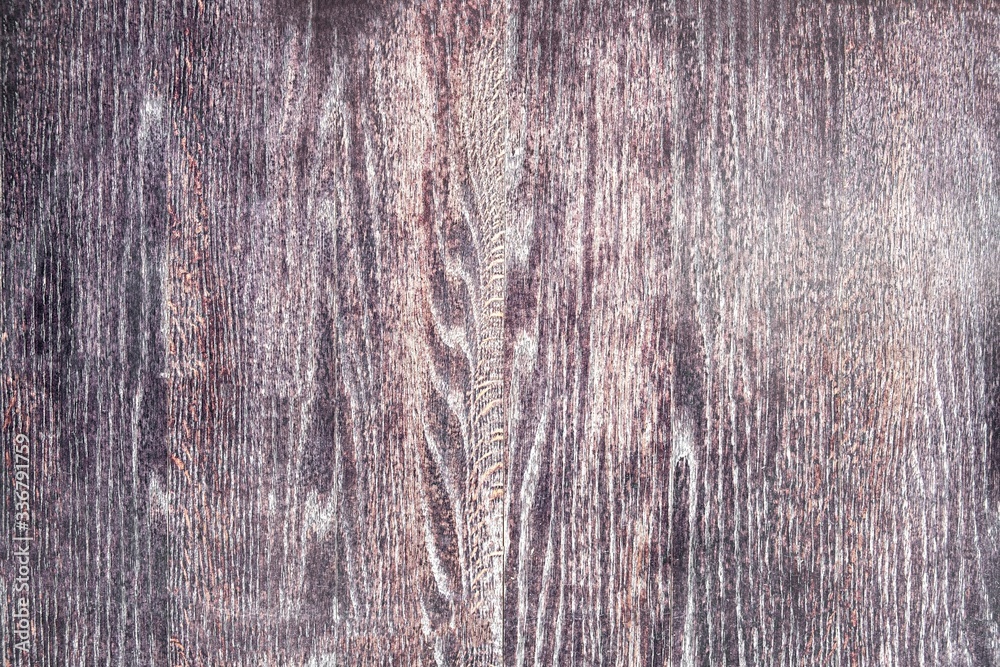 dark gray surface of a wooden plate with white light relief. rough surface texture dark gray surface of a wooden plate with white light relief. rough surface texture