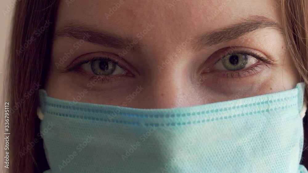 Girl in medical face mask during the covid19, close up