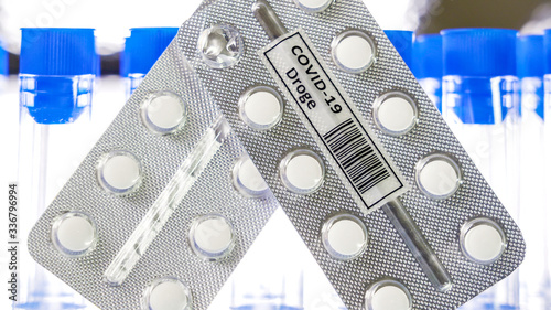 Two packs of the drug Covid-19 Droge written in German tablets for coronavirus