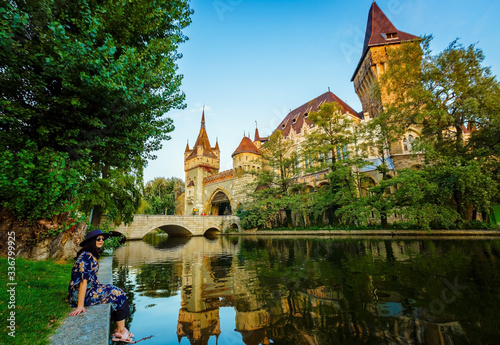Tourist woman and beautiful castle in Budapest