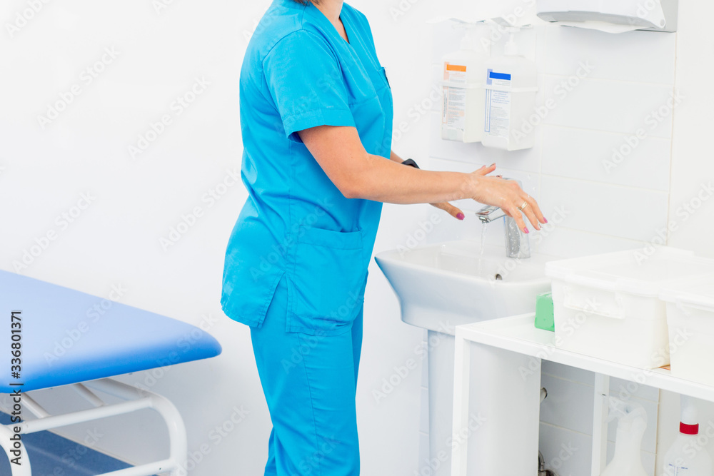 hand washing and sanitizer disinfection. The doctor is preparing to receive patients hand washing and sanitizer disinfection. The doctor is preparing to receive patients