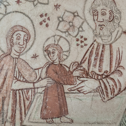 Photography The presentation in the temple, the priest Simeon holds the baby Jesus on an alt