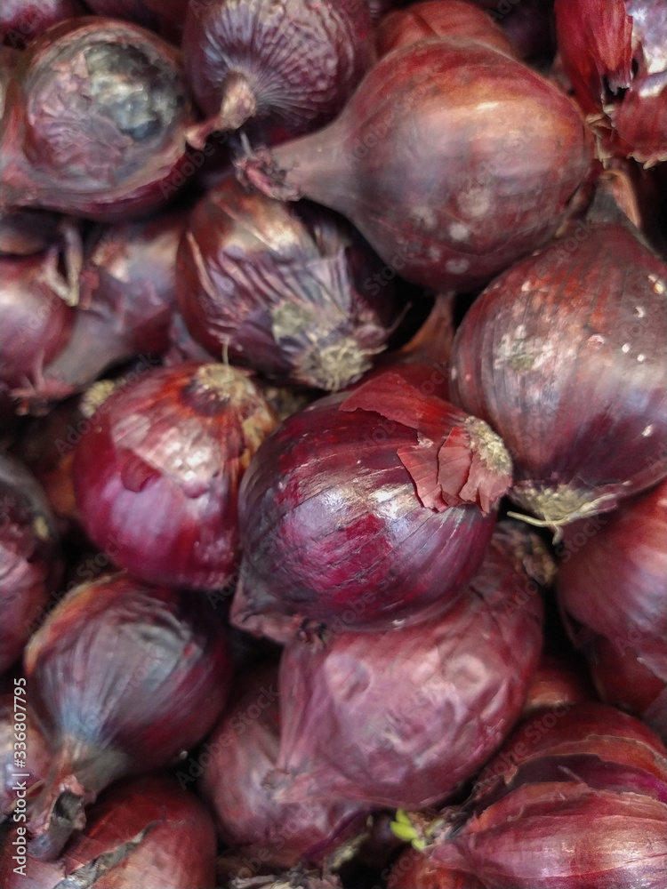 Red onion in box at grocery food store.Buy natural ingredients for healthy and tasty eating.Fresh vegetables at supermarket shop.Cook only natural low fat food for healthy nutrition.