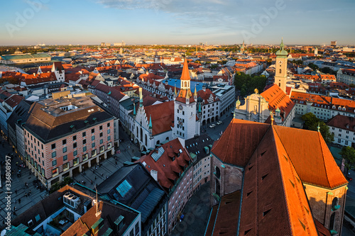 Aerial view of Munich - Marienplatz and Altes Rathaus from St. Peter's church on sunset. Munich, Germany