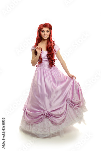 Young beautiful woman wearing a princess gown