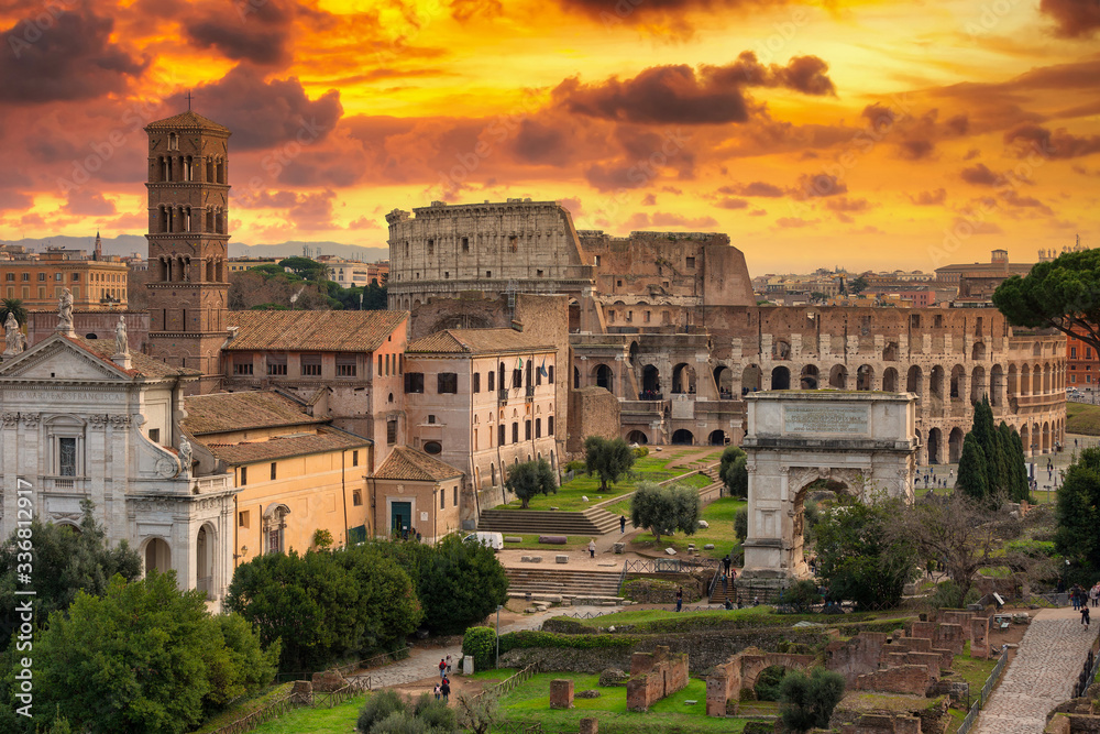 The Colosseum seen from the Palatine hill at sunset in Rome, Italy