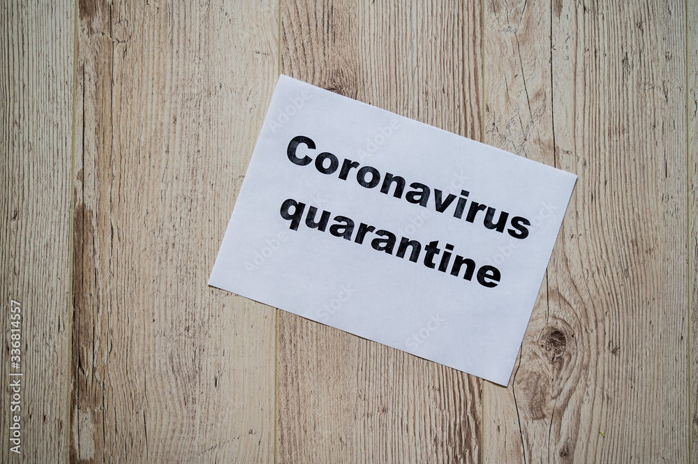 The inscription on a piece of paper quarantine coronavirus. Deadly virus announcement. The inscription on a piece of paper quarantine coronavirus. Deadly virus announcement.