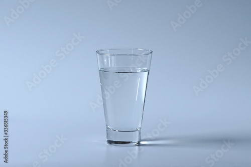 Glass of water on white background.